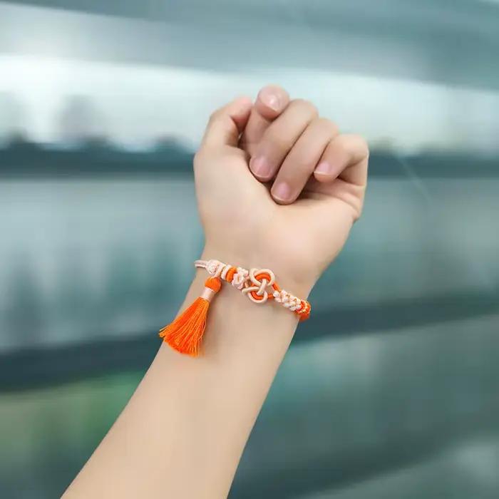 Bracelet tressé fait main style chinois 2026, nœud d'amour réglable avec pompon, motif fleur de pêcher, pour couple, usage quotidien, soirée, cadeau