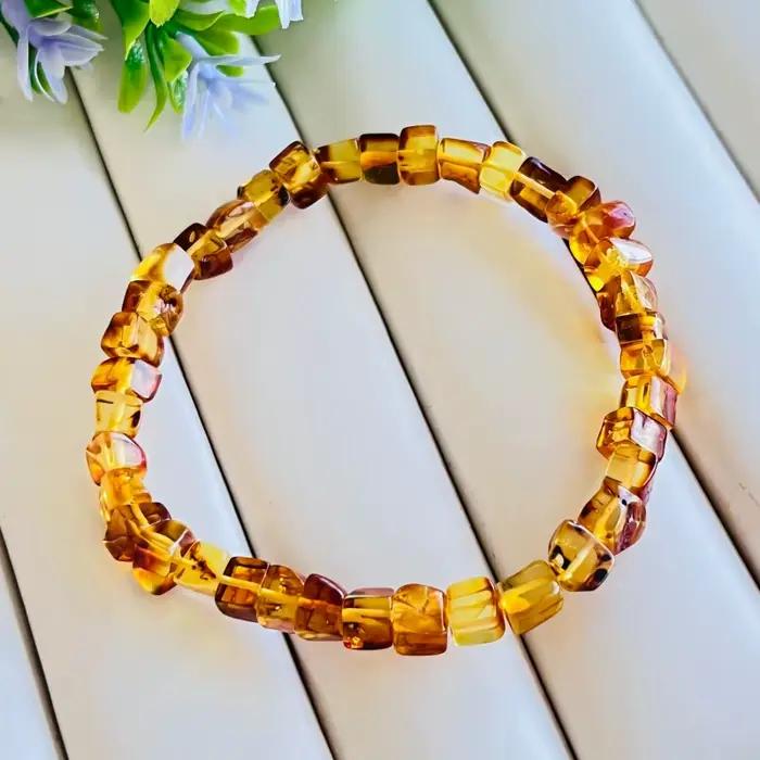 Bracelet en ambre naturel unisexe avec design vendange et bienfaits thérapeutiques pour femmes et hommes occasions spéciales