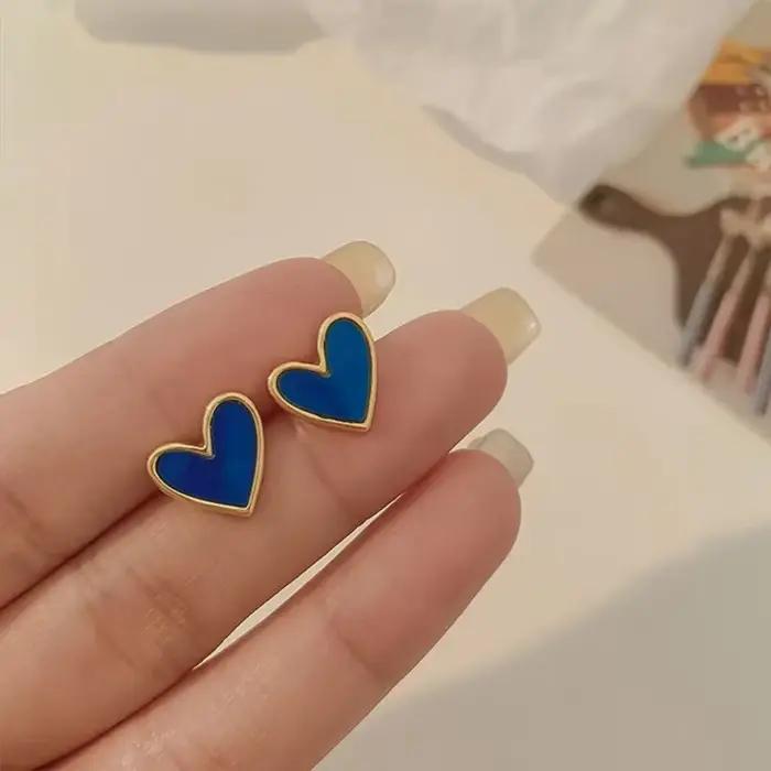 Vintage en forme de coeur bleu blanc amour boucles d'oreilles femme tempérament Niche