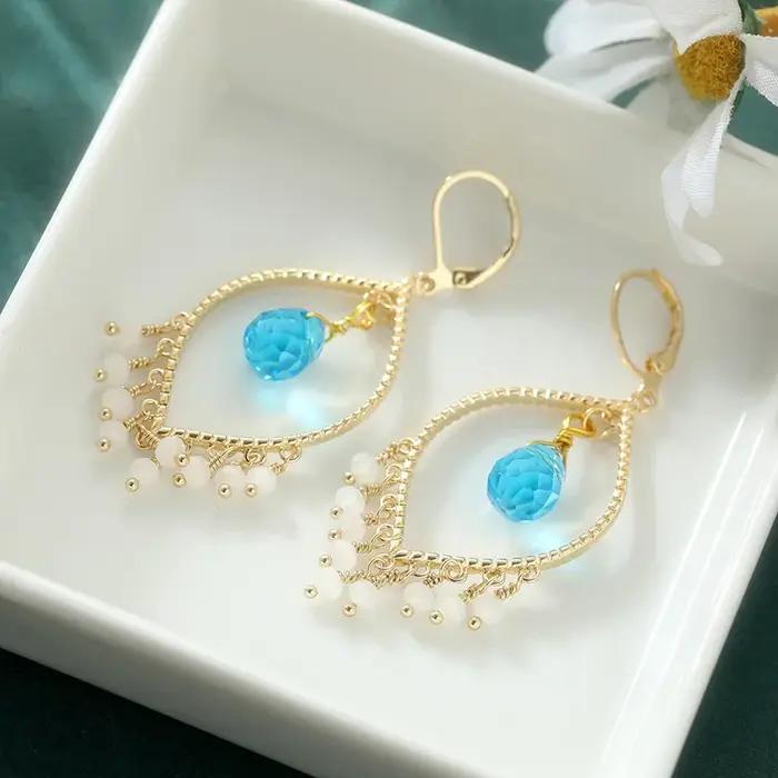 Boucles d'oreilles pendantes dorées style bohème avec perles d'imitation