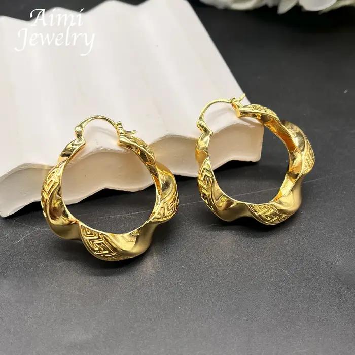 Grandes boucles d'oreilles et pendentif italiens