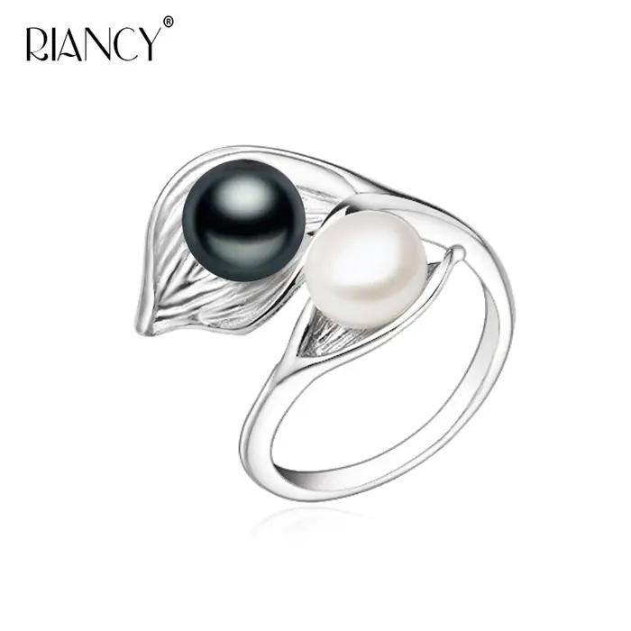 Bague en perles d'eau douce naturelles noires et blanches pour femmes