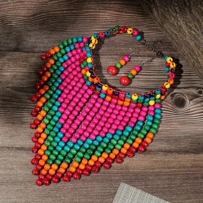 Ensemble de bijoux africains style bohème vintage collier bib perles de bois faites à la main boucles d'oreilles pour femmes accessoires de fête occasions spéciales