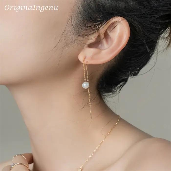 Boucles d'oreilles pendantes faites à la main pour femmes