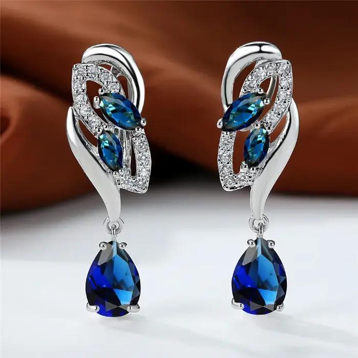 Boucles d'oreilles de luxe en pierre arc-en-ciel bleue pour femmes avec zircon, élégantes et sophistiquées pour occasions spéciales