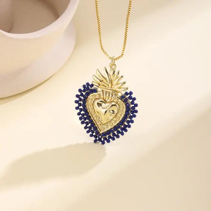 Nidin – collier avec pendentif en forme de cœur sacré, inspiré du vintage, fait à la main, avec perl