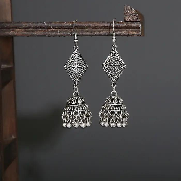Boucles d'oreilles vintage ethniques en alliage de zinc pour femmes, élégantes et originales à porter pour des occasions spéciales et la vie quotidienne