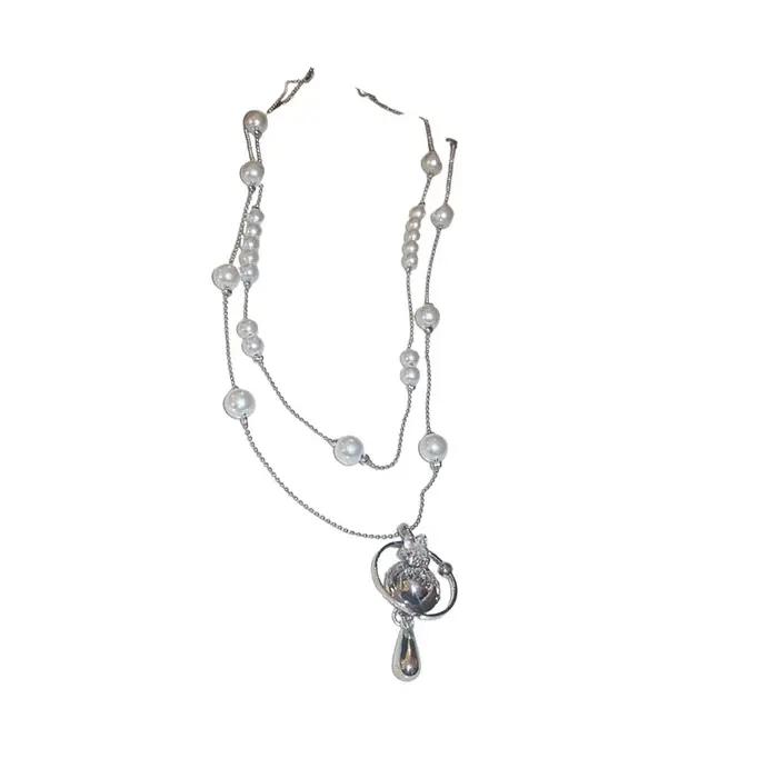 Collier de perles en forme de goutte d'eau saturne incrustée de diamants