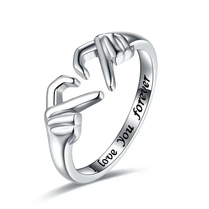 Bague romantique en forme de cœur ajustable pour femmes et hommes alliances de mariage en alliage de zinc blanc or noir pour célébrer l'amour et l'amitié
