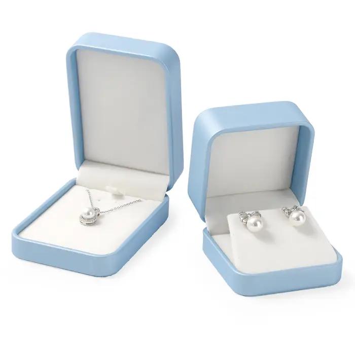 Boîte à bijoux bleue de qualité supérieure avec doublure en velours pour rangement et protection de colliers bagues boucles doreilles et bracelets occasions spéciales famille bijoutier