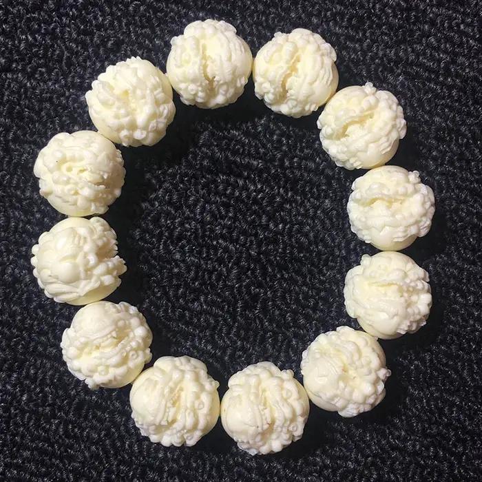 Bracelet de perles Pixiu sculptées en ivoire naturel