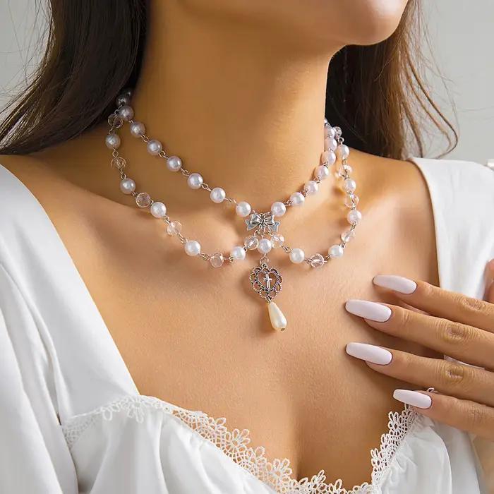 Collier Lolita en Dentelle Blanche avec Pompon en Perles et Strass Cadeau Mode pour Fille Occasions Spéciales Nouvelle Collection