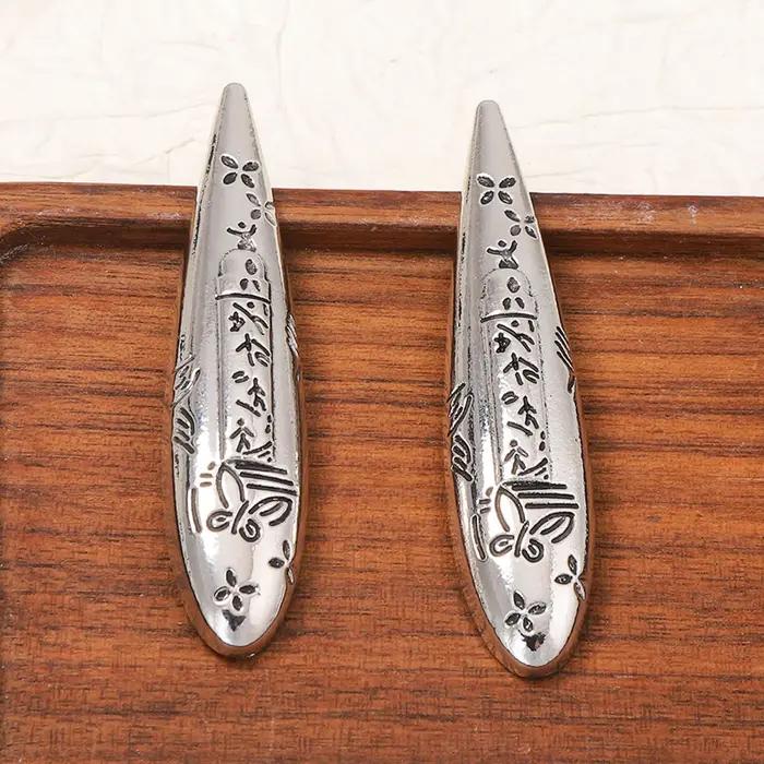 Boucles d'oreilles vintage en alliage de zinc forme goutte d'eau géométrique pour femmes occasions spéciales à offrir elegance glamour