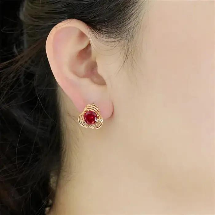 Boucles d'oreilles fleur incrustées d'or violet pour femme
