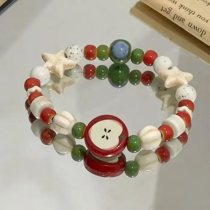 Bracelet en céramique de perles d'os de fruits multicolores fait à la main pour femmes, extensible, bijoux ethniques Boho pour occasions spéciales