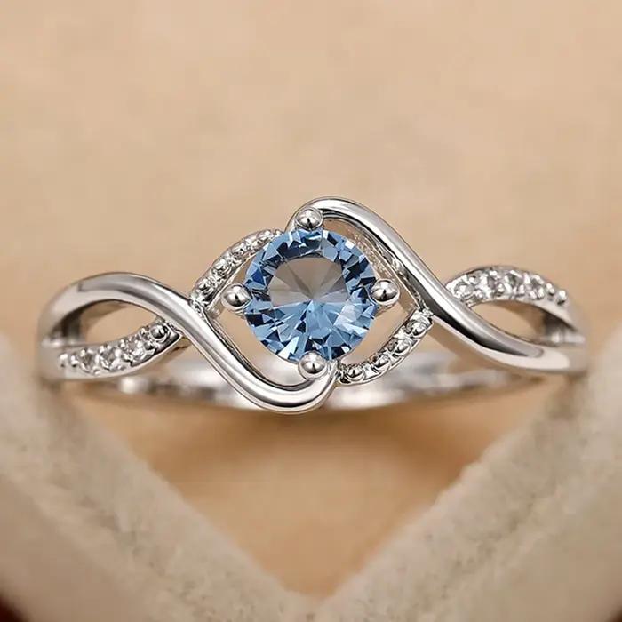 Alliance de mariage Huitan en laiton avec zircone cubique bleue, moderne et élégante pour mariage et anniversaire de mariage