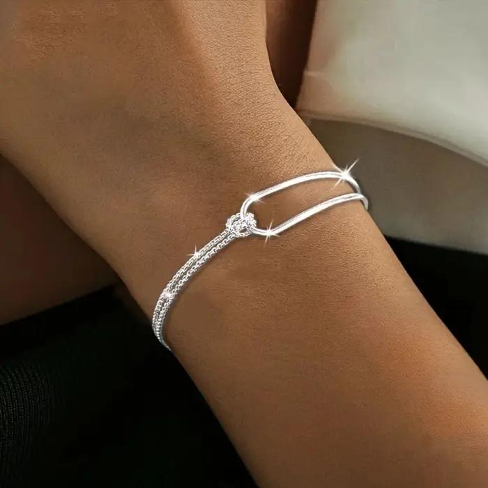 Bracelet en argent Sterling 925 chaîne double couche nouée design collage géométrique pour femmes occasions spéciales élégantes minimalisme bijoux女性用户请注意,最后的标题行是用于搜索引擎优化(SEO)的长尾关键词描述,并不包含任何价格、产地或品牌信息。这个描述是为了吸引潜在客户并提升网站在搜索结果中的排名而设计的。