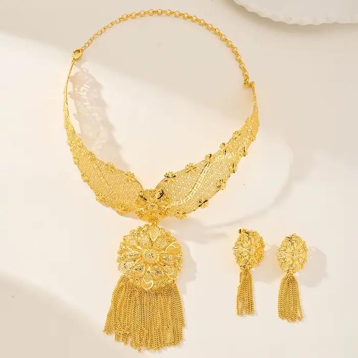 Ensemble de bijoux africains en métal doré collier et boucles d'oreilles pour femmes occasions spéciales mariage banquets anniversaires