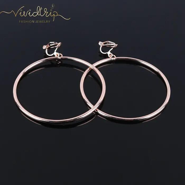 Boucles d'oreilles à clip rondes géométriques classiques pour femmes