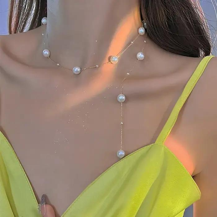 Nouveau Simple Long Imitation perles dos collier pour femmes Sexy gland perle harnais Bikini poitrine chaîne corps bijoux Mujer