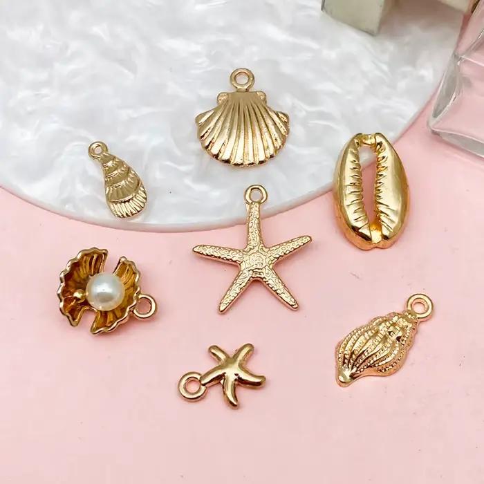 Nouveau 16 pièces couleur or océan coquille conque étoile de mer breloques pour la fabrication de bijoux collier porte-clés chaîne de téléphone bricolage matériaux Colorfast