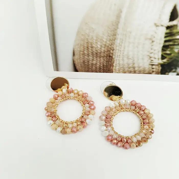 Boucles d'oreilles en perles de riz à tricoter à la main