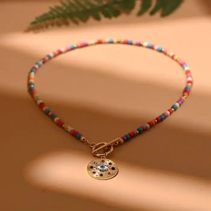 Collier pendentif oeil mignon romantique en alliage de zinc avec chaîne perles pour femmes occasions spéciales tracker d'humeur