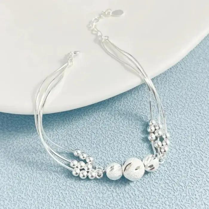 Bracelet en argent sterling 925 élégant avec breloques rondes pour femmes occasions spéciales style moderne tendance