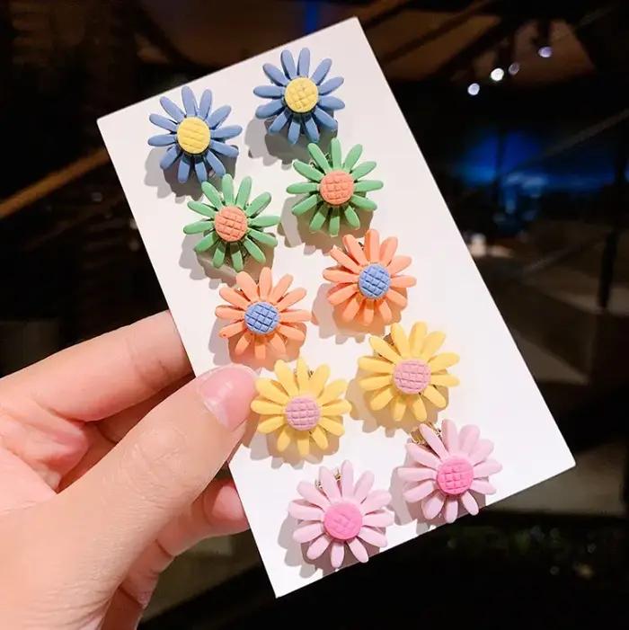Clips à boucles d'oreilles pour filles enfants motifs dessins animés coquilles étoiles fleurs papillons 5 paires bijoux enfant fantaisie浪漫风格的耳环夹子HTML描述完成。注意,由于原始信息中提到的是塑料材质,并没有提及任何金属成分或特殊涂层,因此在描述中尽量避免使用可能暗示金属或其他特殊材质的词汇。同时,也遵循了不提及价格、产地、库存等具体细节的要求。最后提供的标题也完全符合要求,包含了产品的关键信息,如材质、样式、用途等,但未包含价格和产地信息。
