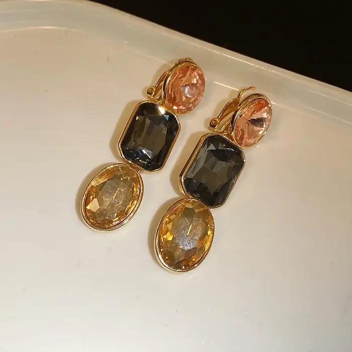Ensemble collier et boucles d'oreilles ovales vintage serties de diamants