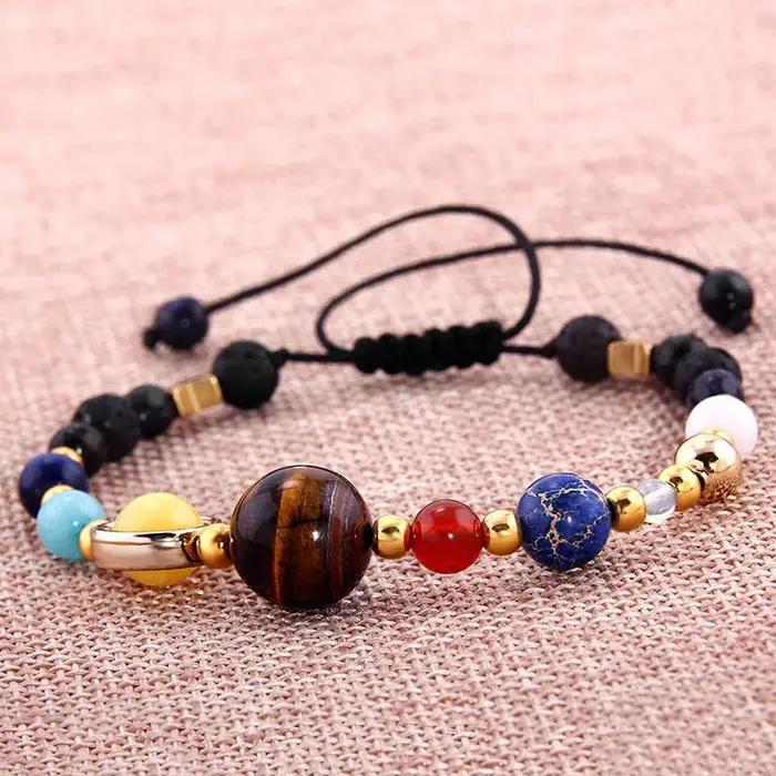 Bracelet Cosmic Galaxy HJUEY en pierre avec gravure de huit planètes pour homme et femme pour célébrer l'univers et l'astronomie occasions spéciales