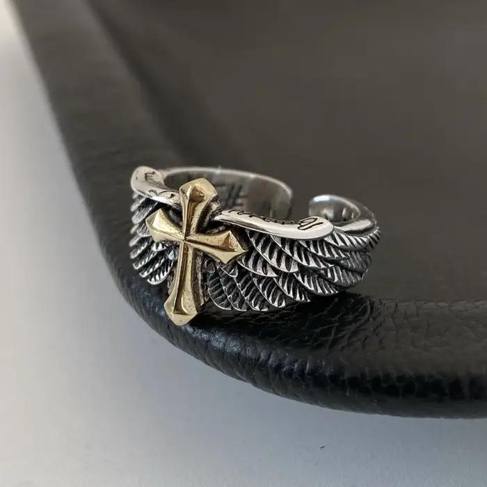Bague en acier inoxydable ailée croisée audacieuse design gothique ajustable pour hommes bijoux punk rock style graffiti occasionnels
