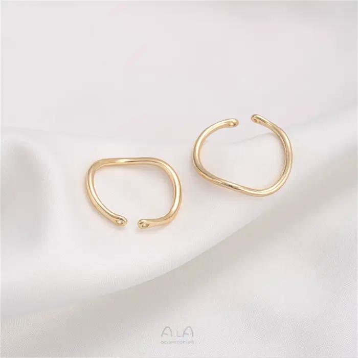 Ensemble de bagues incurvées ondulées enveloppées d'or 14K