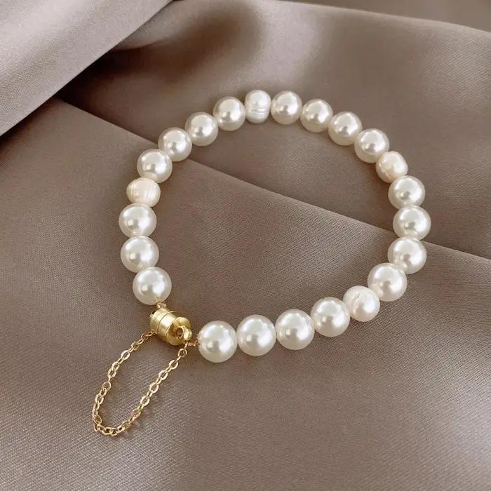 Bracelet élégant en fausses perles pour femmes, boutons magnétiques, design créatif, accessoires de