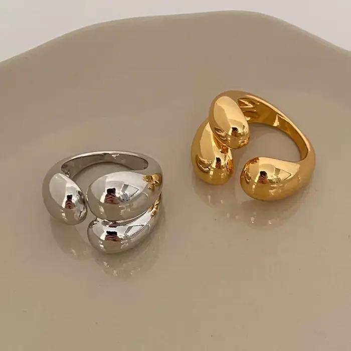 ANENJERY couleur argent asymétrique gouttelettes d'eau anneaux pour femmes Simple mode ouvert bague dorée conception coréenne bijoux