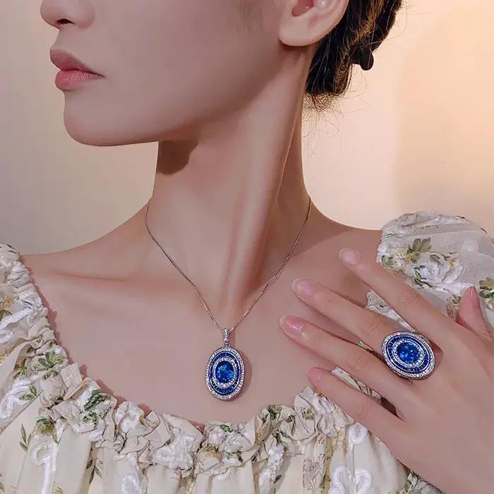 Bague ovale de luxe en saphir bleu réglable