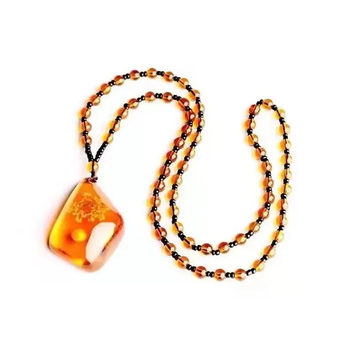 Collier en résine ambre imitation jade jaune pendentif cœur et fleur unique pour femmes occasions spéciales bijou cadeau