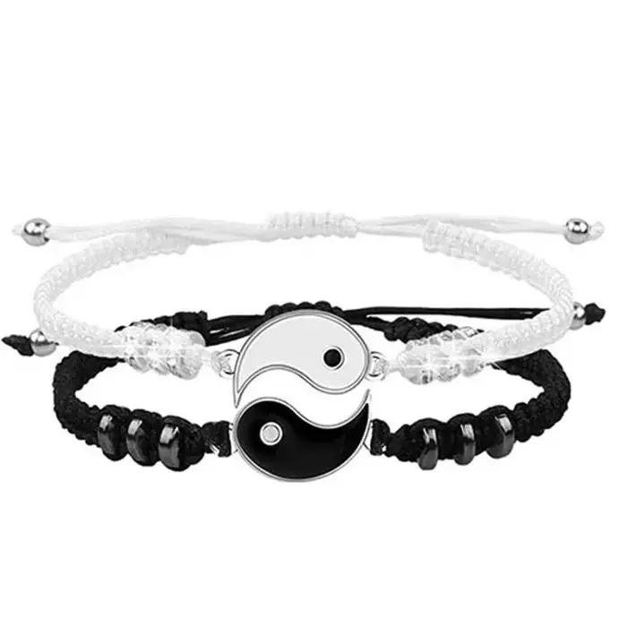1 lot de 2 bracelets de réglage télescopique tressés en corde Yin et Yang simples Tai Chi Bagua noir et blanc pour hommes et femmes Coupl