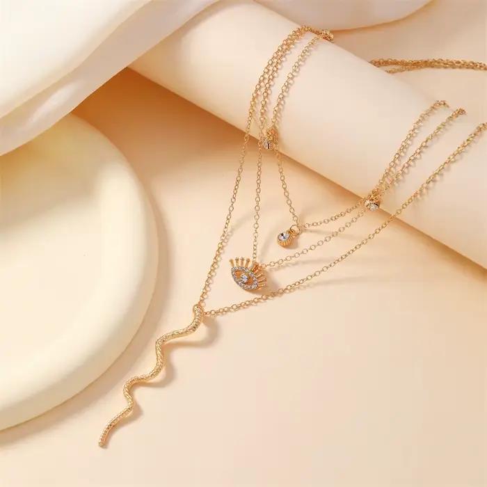 Collier de luxe en forme d'œil Serpentine pour femmes doré chaîne Y pompon cadeau pour anniversaire mariage