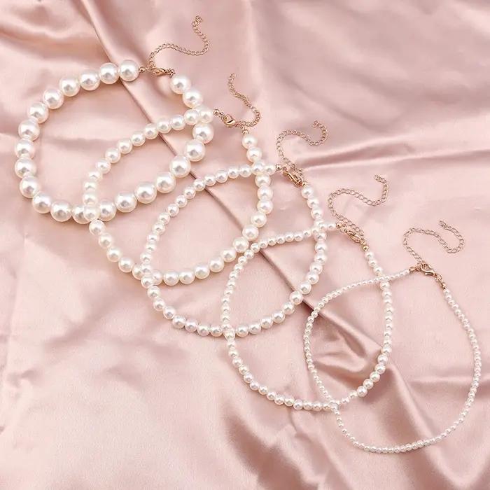 Bracelet élégant en perles d'imitation faites à la main pour femmes et filles