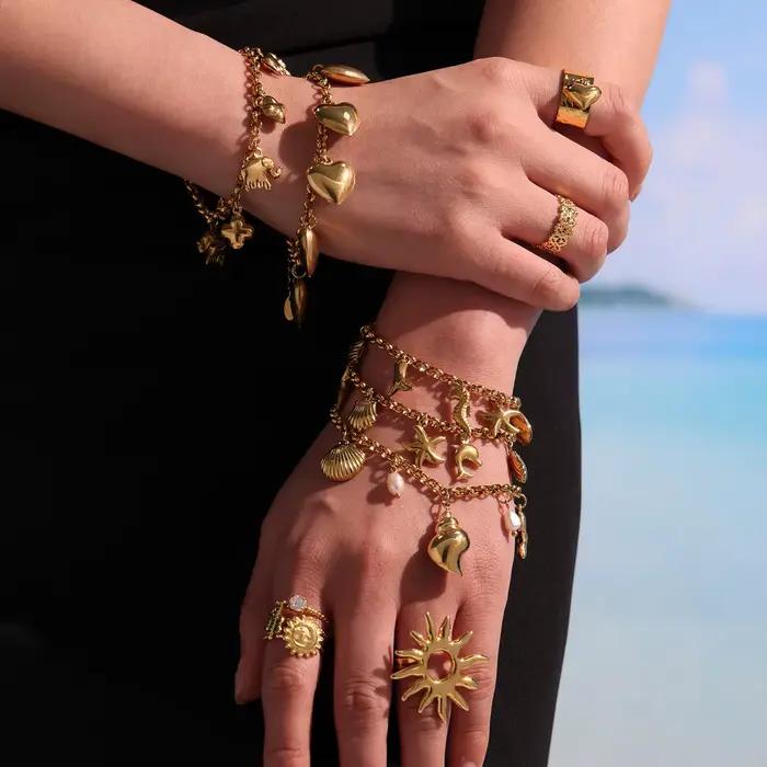 Bracelet à breloque en acier inoxydable pour femmes plaqué or éléphant mignon élégant pour occasions professionnelles et quotidiennes
