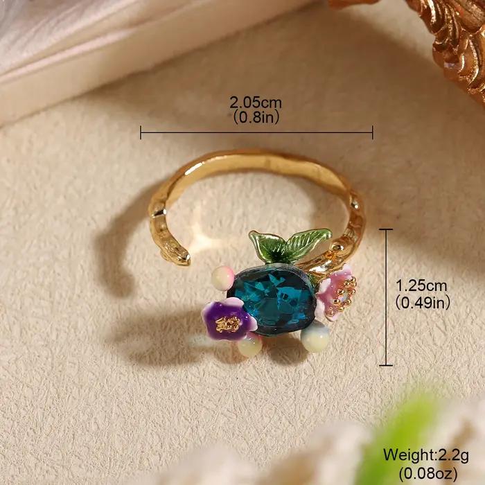Bague ouverte ajustable chic avec pierre bleue et fleurs en émail colorées - Bijoux inspirés de la nature couleur or pour elle