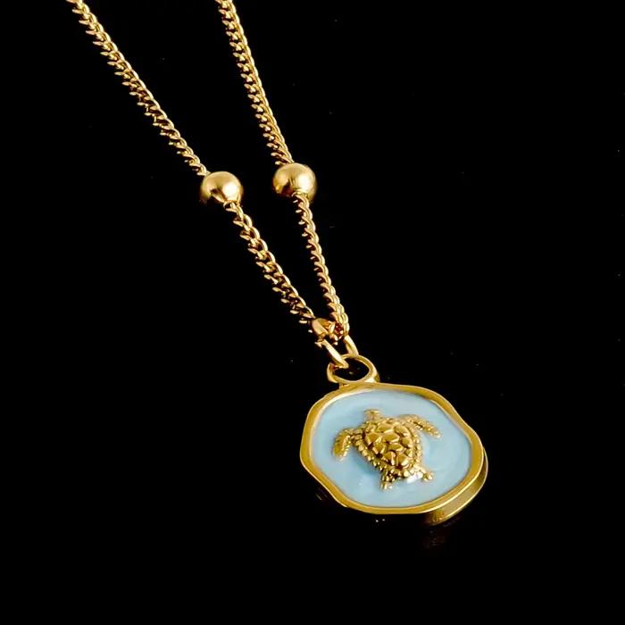 Collier marin en acier inoxydable plaqué or véritable avec perles et pendentifs coquillage