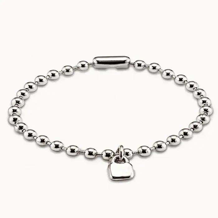 Bracelet à perles rondes argentées polyvalent pour les vacances européennes et américaines 2025