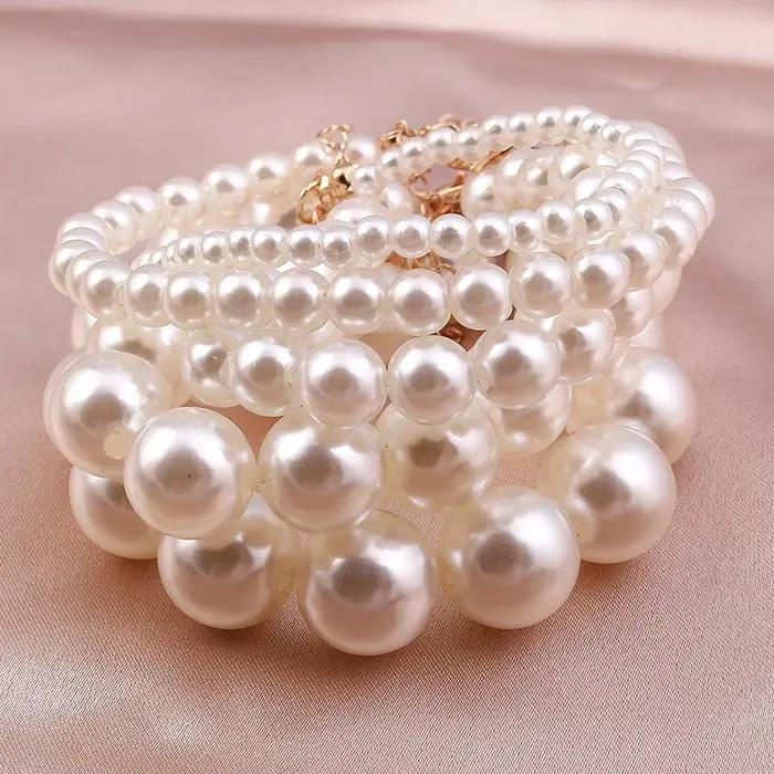 Bracelet élégant en perles d'imitation faites à la main pour femmes et filles