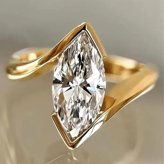 Huitan – bague en forme de marquise pour femmes, couleur argent/or, incrustée de CZ brillant, accessoires de mode pour fête de mariage, bijoux polyvalents