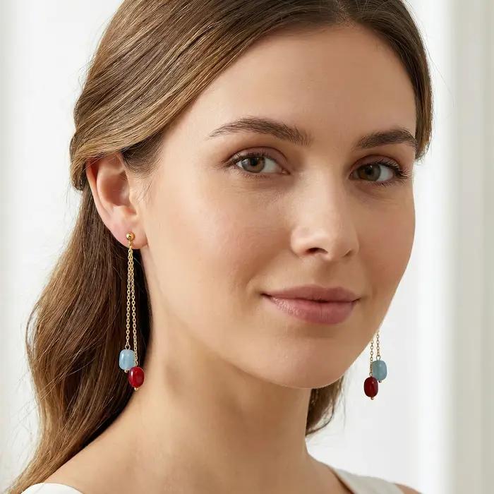Boucles d'oreilles longues élégantes avec pendentif en pierre colorée