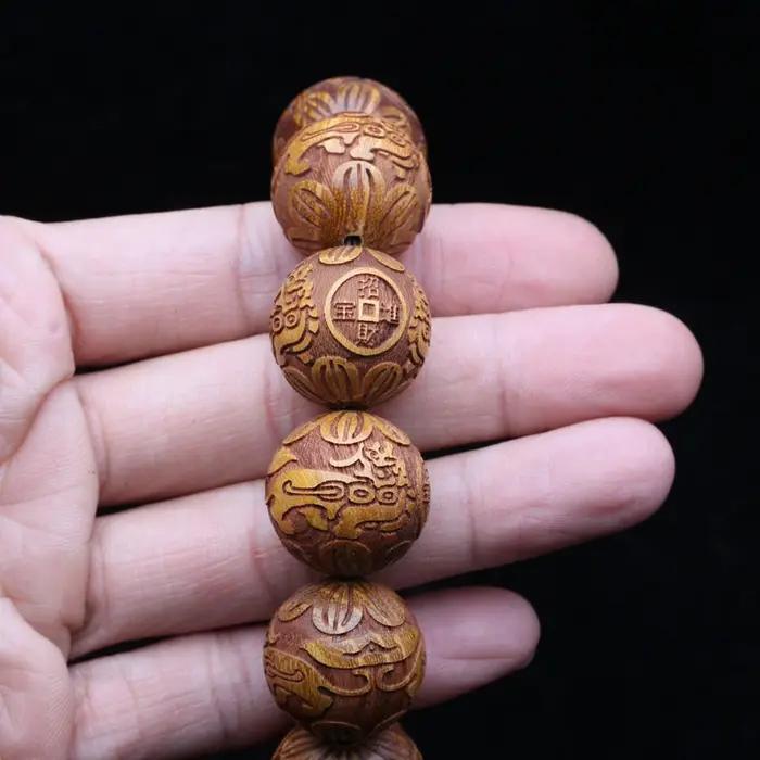 Bracelet en bois naturel sculpté dieu bête richesse