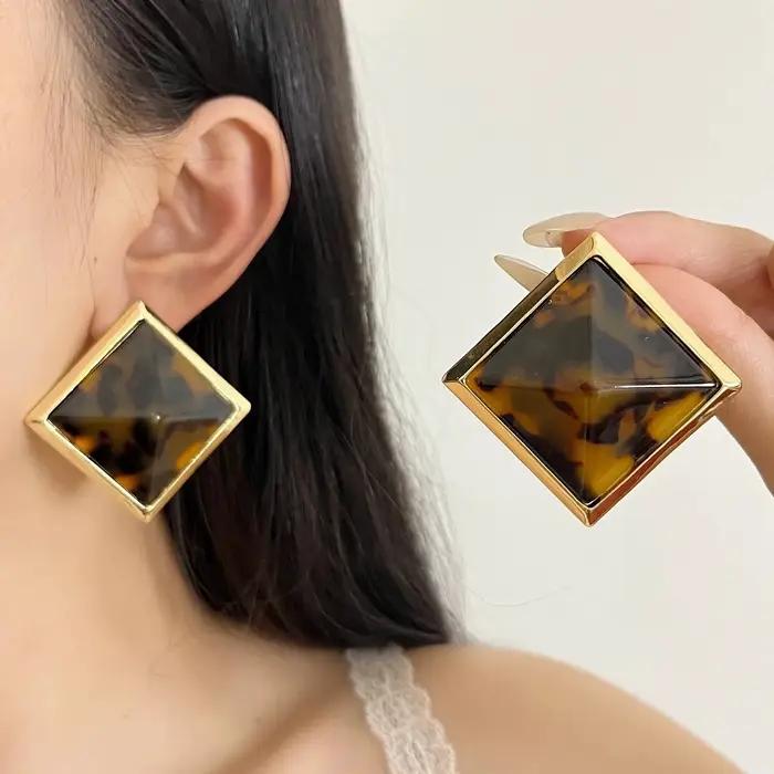 Boucles d'oreilles en losange géométrique exagéré
