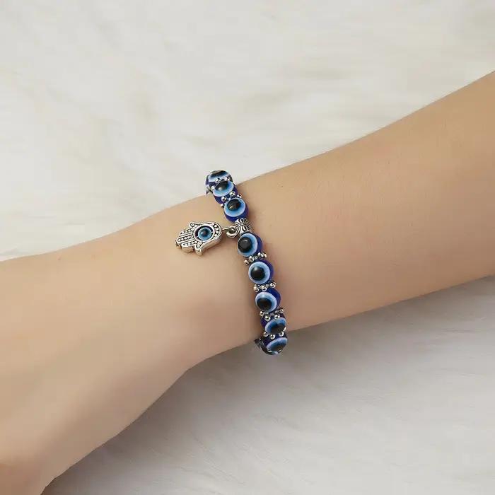 Bracelet mauvais œil bleu main de Fatima dinde mille yeux souhait fait